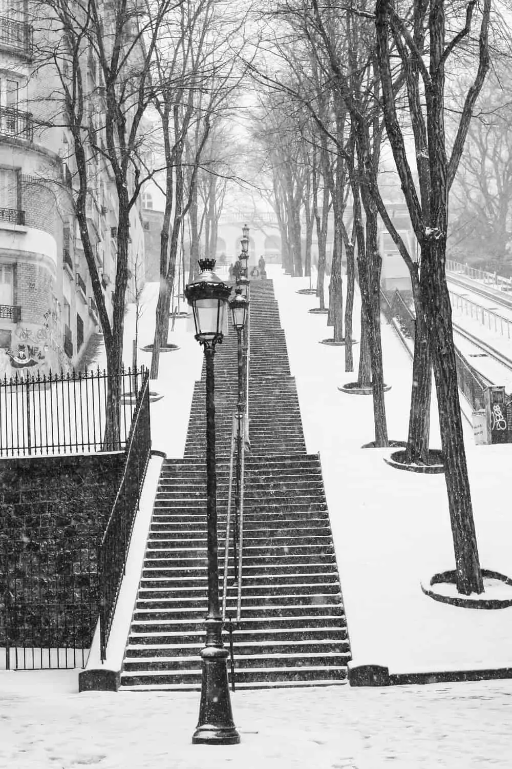 Montmartre stairs in the snow Paris France 