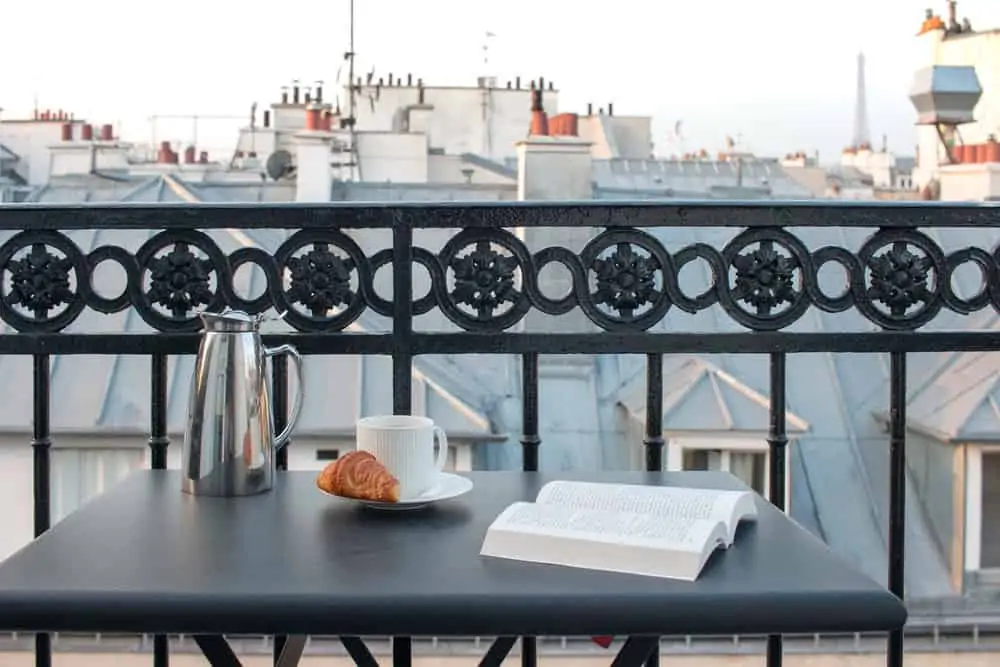 breakfast on the balcony in paris, france at pavillon des lettres