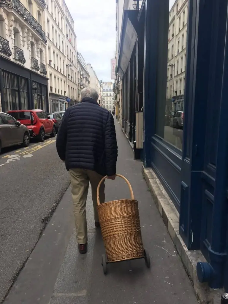 Old man with trolly on the way to French market