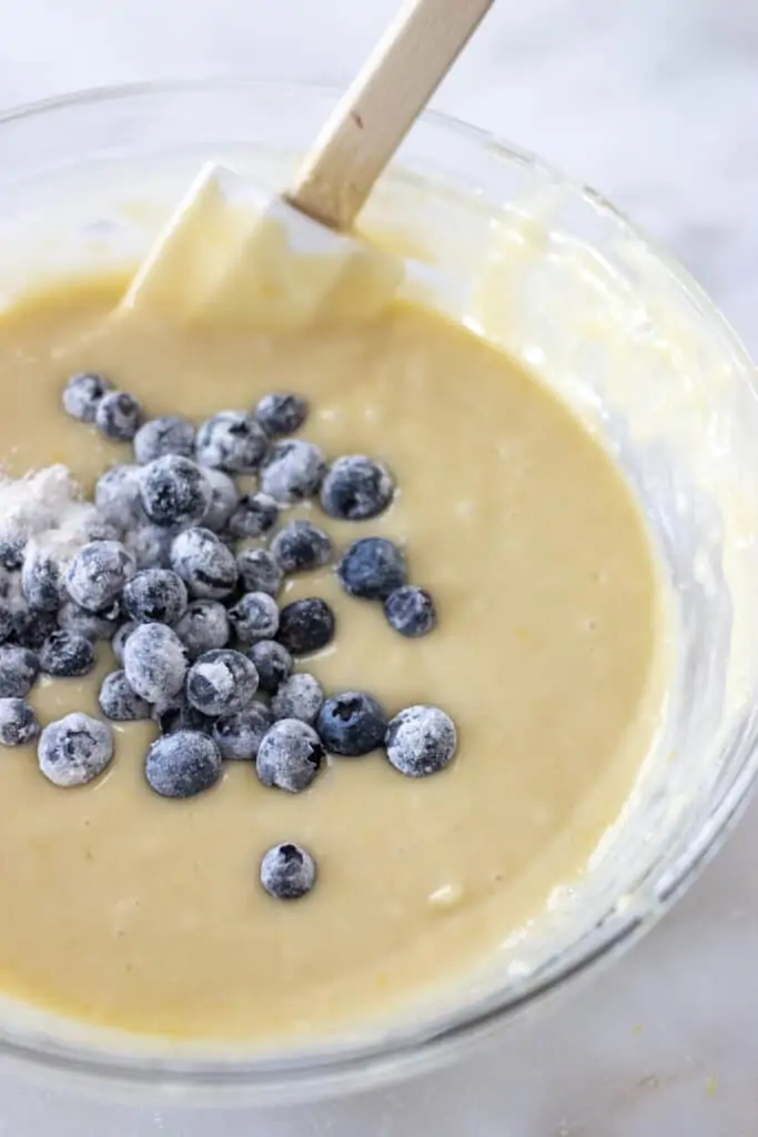 blueberries mixed in a flour