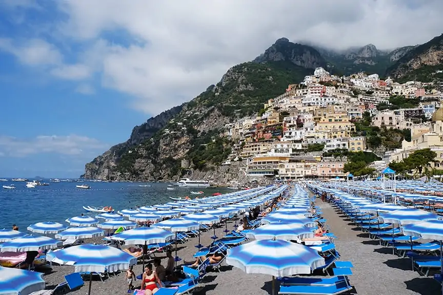 beach umbrellas in the shore for Amalfi Coast Guide