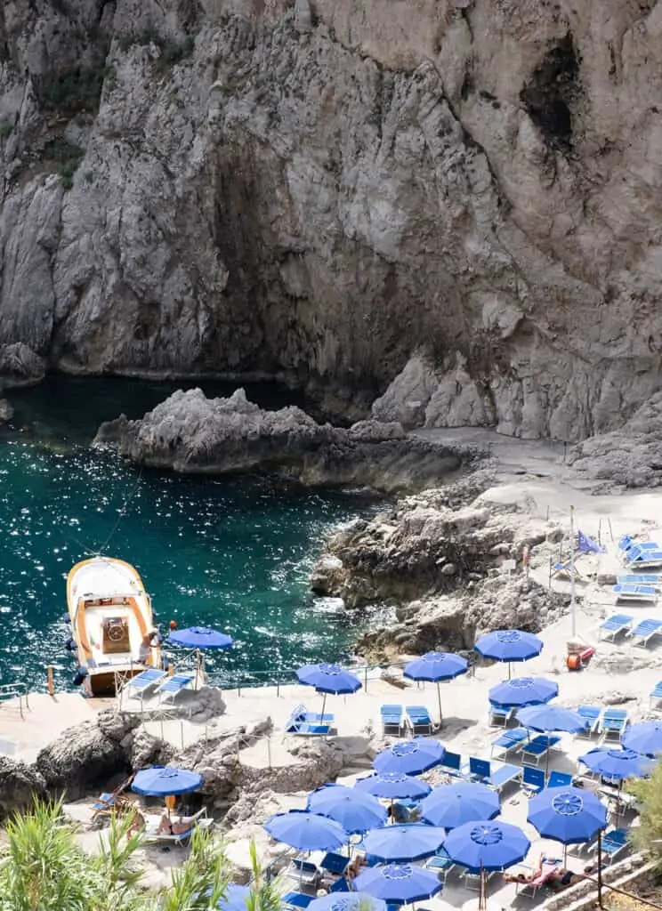 beach side with blue beach umbrellas