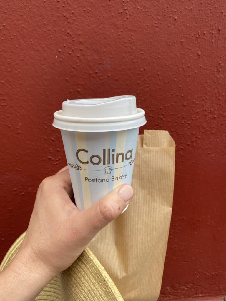 person holding collina coffee