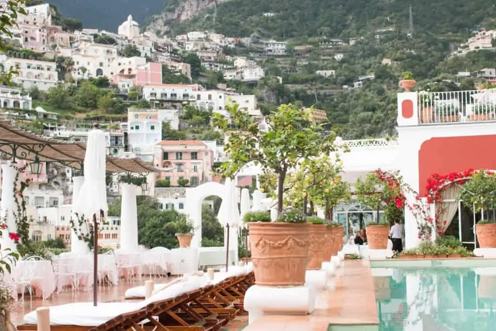 tables at the poolside at Le Sireneuse in Positano Italy 