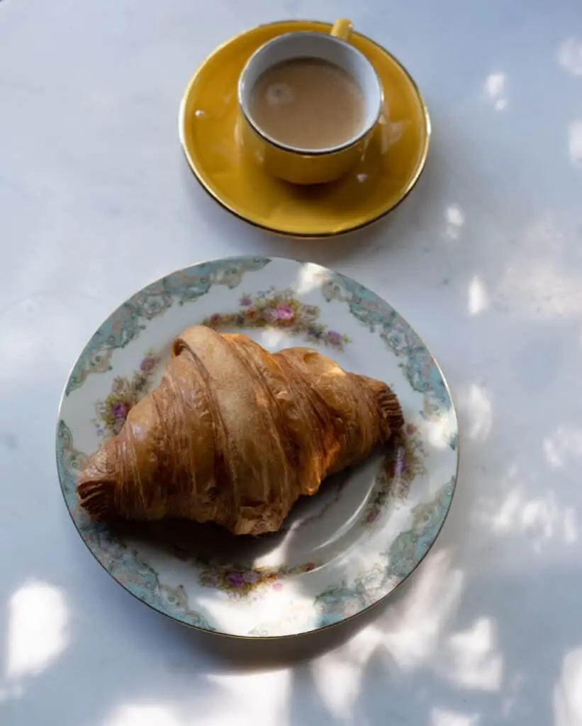 Frenchify Your Breakfast with coffee and croissant 