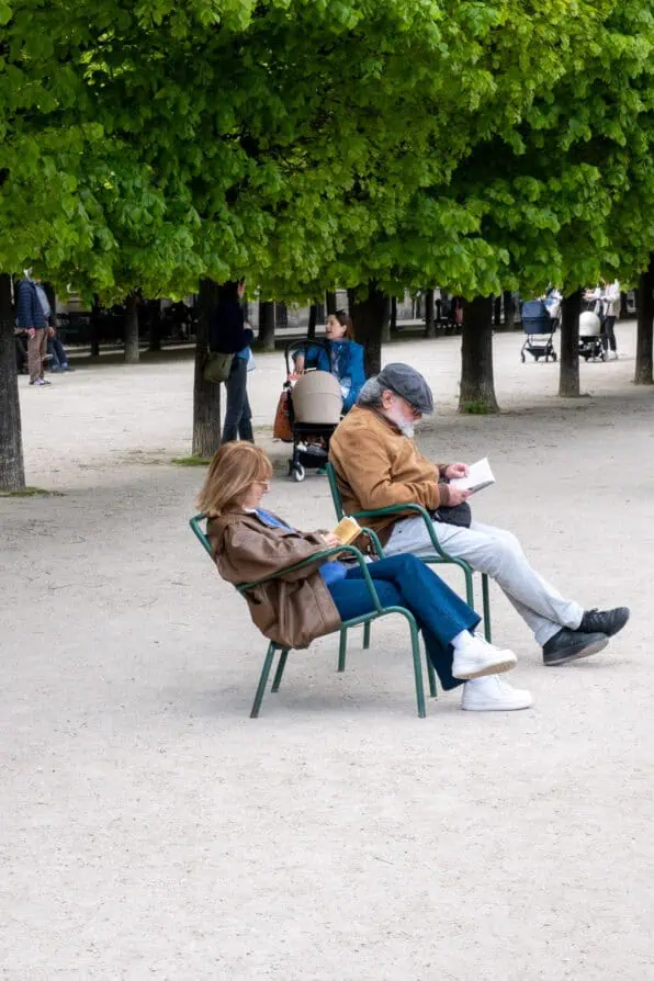 Parisians reading in Palais Royal Spring 2026