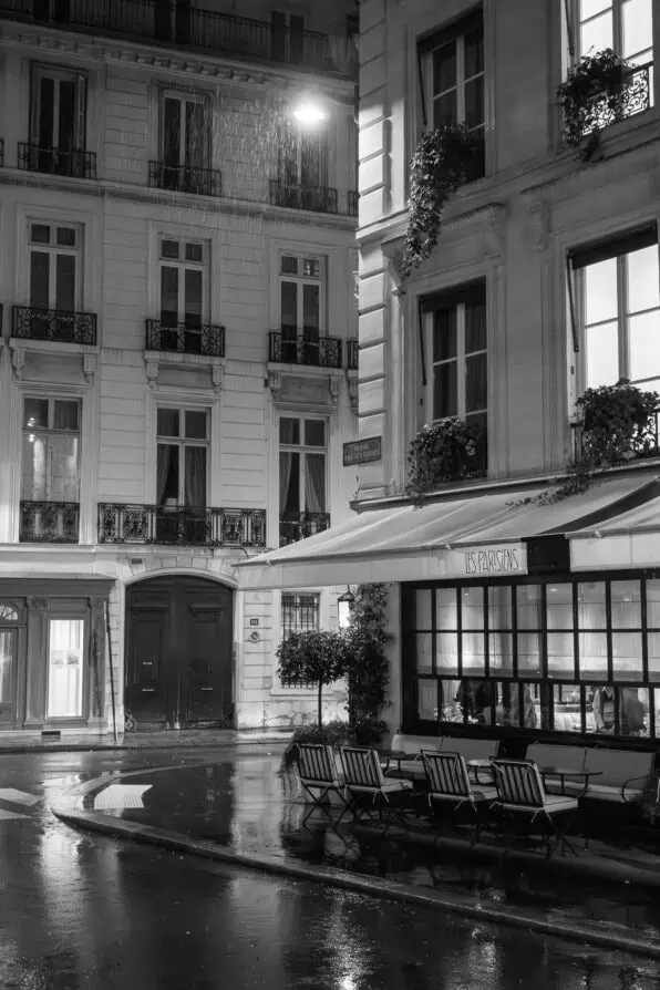rainy black and white Parisian corner