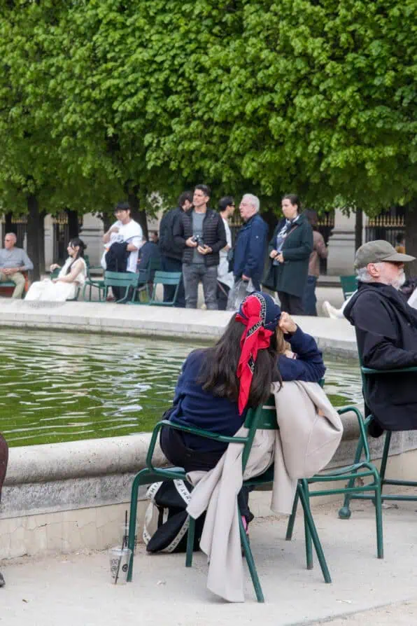 headscarf Parisian woman in Palais Royal