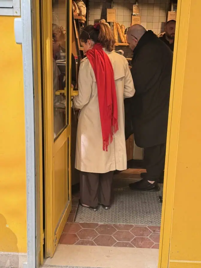 red scarf Parisian at local boulangerie