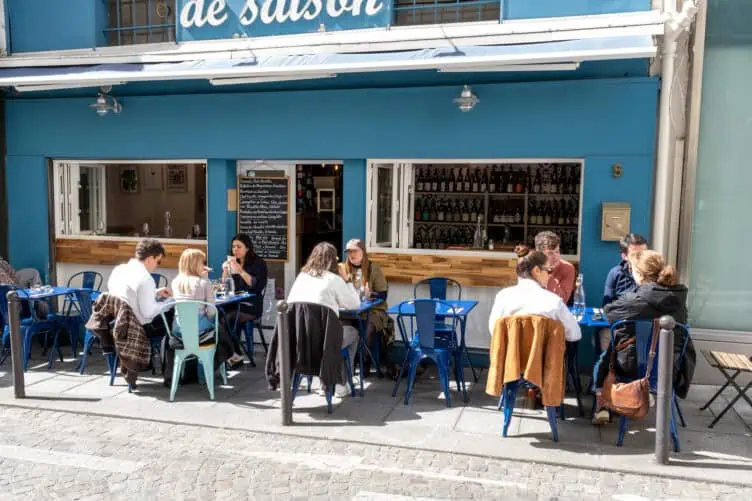 Parisians on sunny terrace in spring