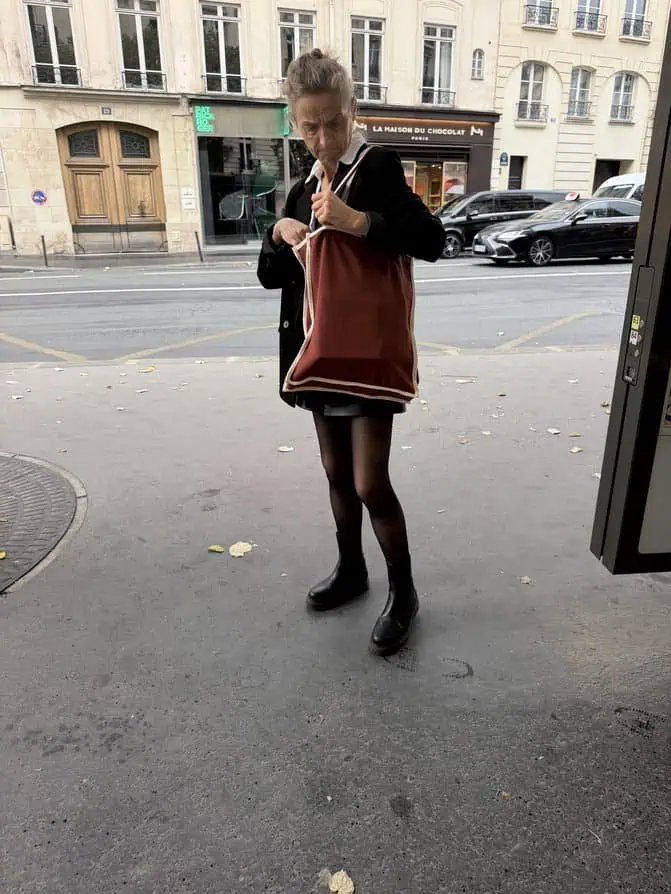 black boots and black tights Parisian trends